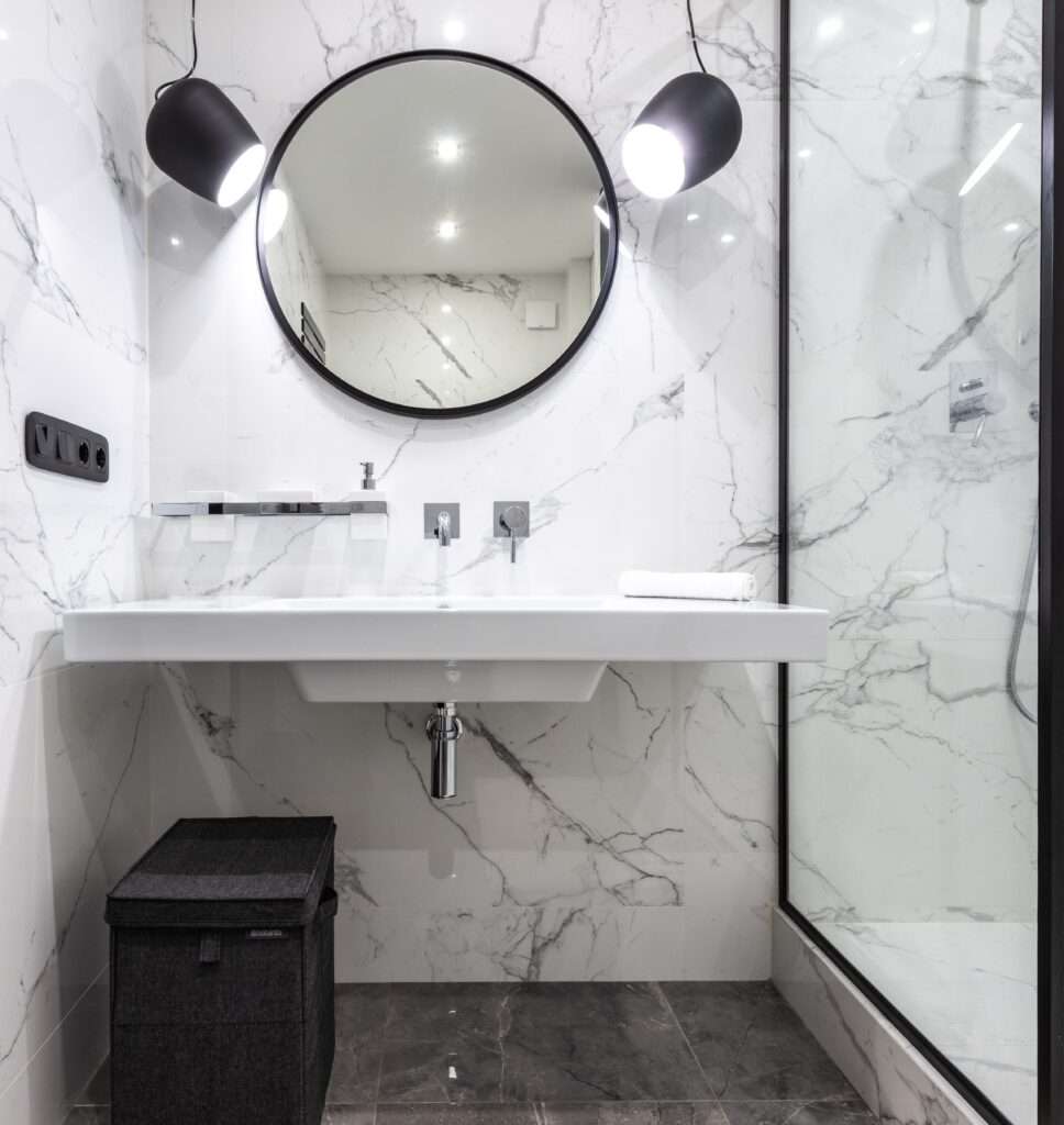 An image of renovated bathroom with minimalist fixtures